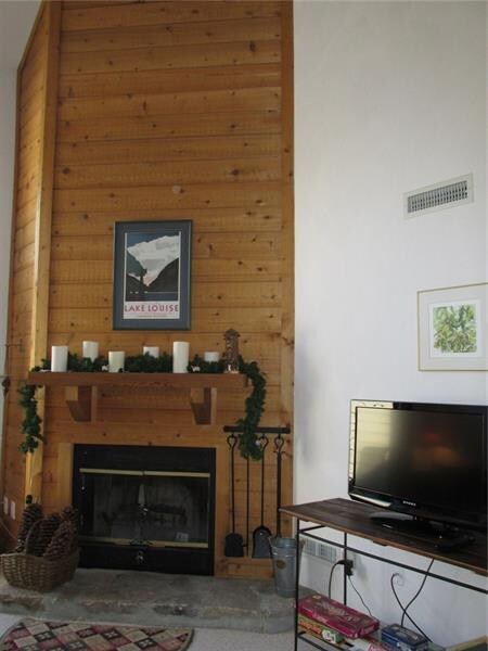Floor to second floor! This cedar faced, wood burn
