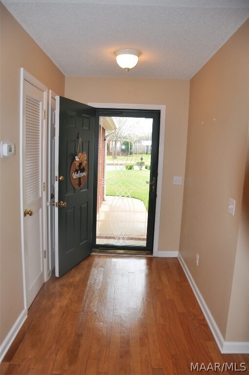 Foyer looking through the glass storm door.