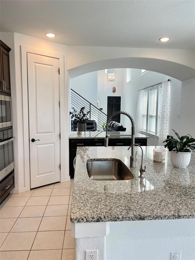 Kitchen featuring appliances with stainless steel