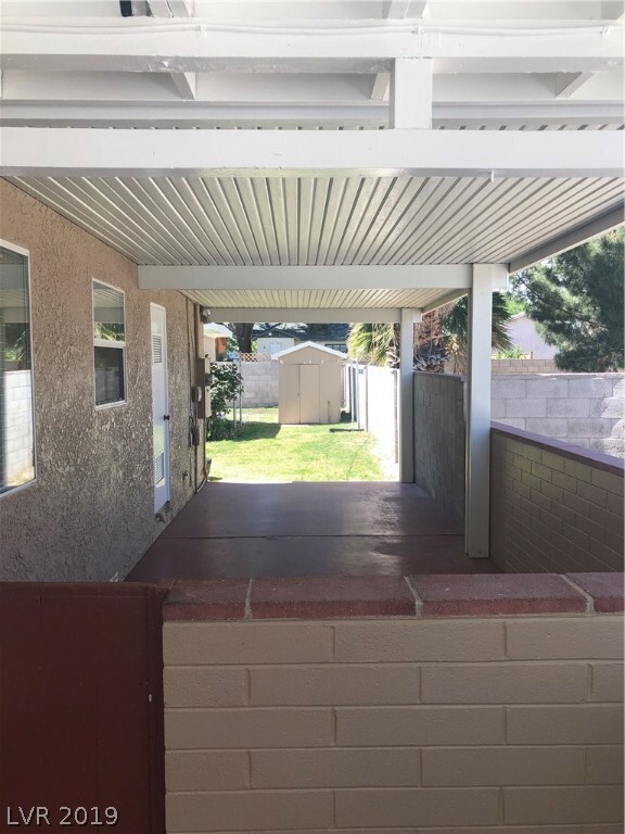 Carport With Alumawood Cover Extended to the Rear