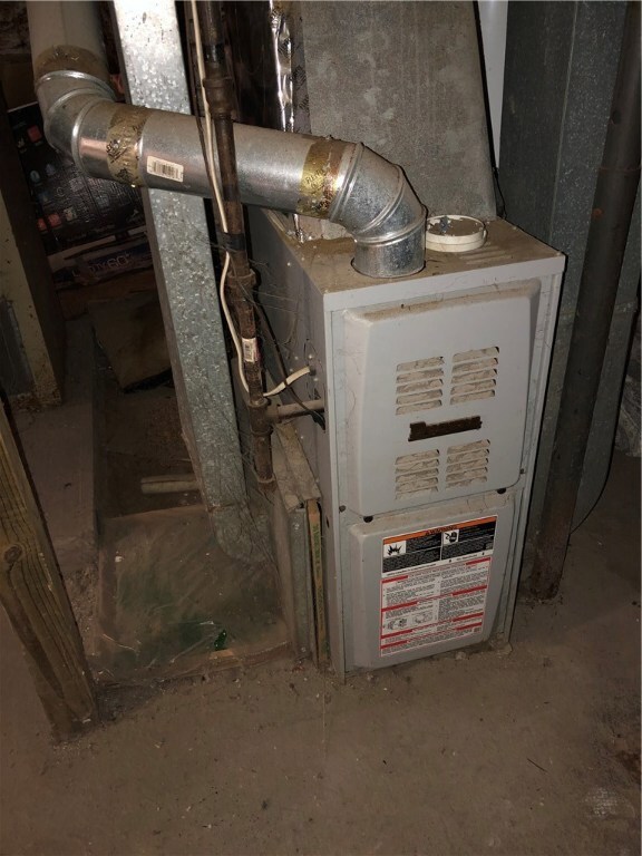 2 Gas Furnaces.   Each tenant pays their own heat/