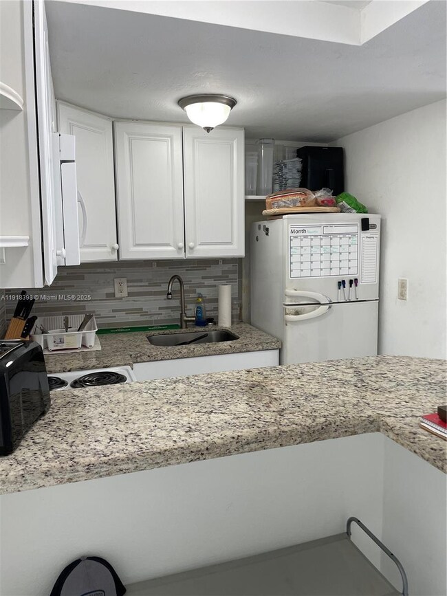 Gardens on the Bay unit 125, Miami Beach, FL 33141 - photo 7