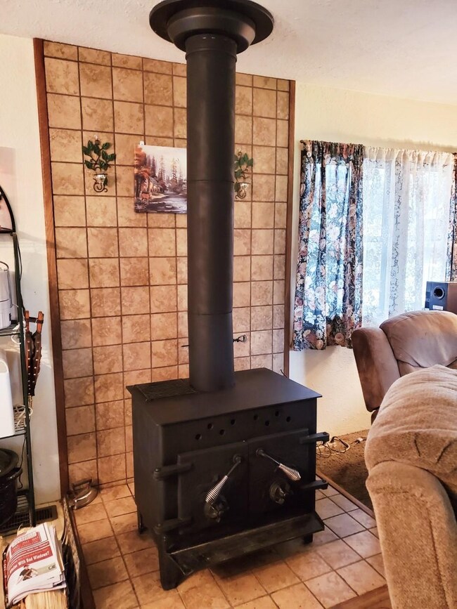 Tangent wood stove
