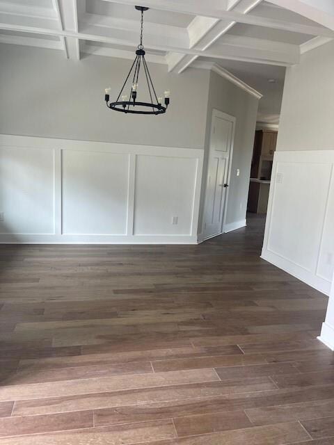 Unfurnished dining area with coffered ceiling, a c