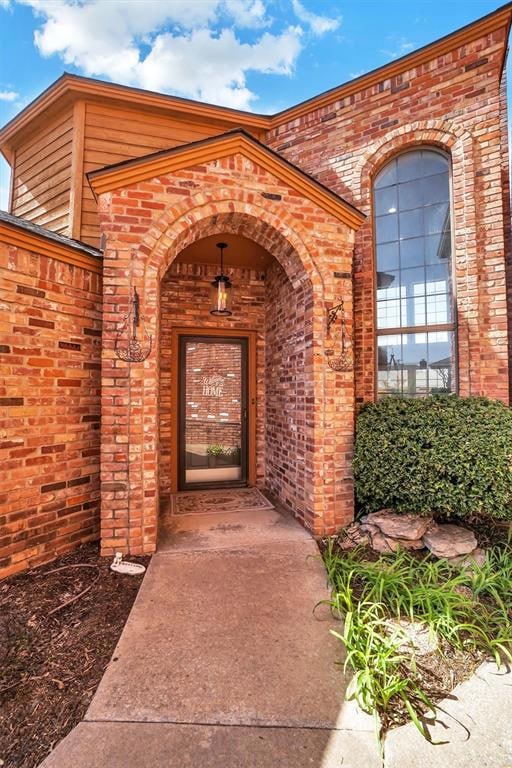 Property entrance with brick siding