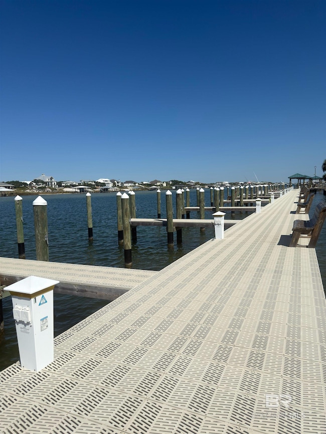 Dock featuring a water view