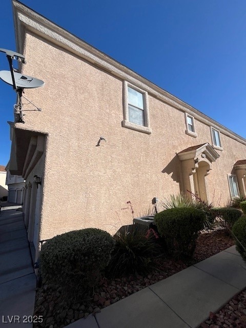 View of home's exterior with stucco siding