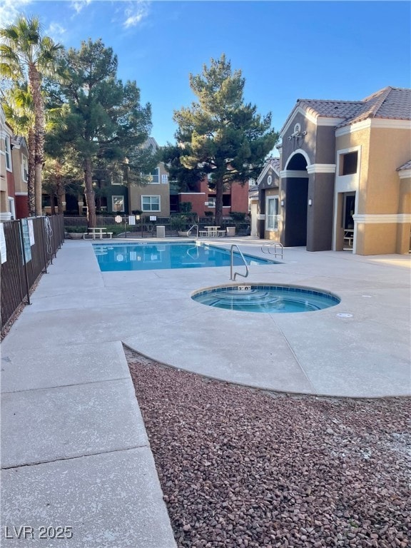 COMMUNITY POOL WITH A PATIO AREA