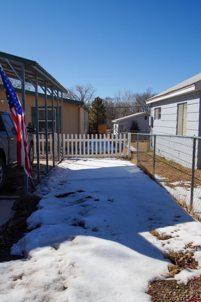 Room to park on either side of Carport