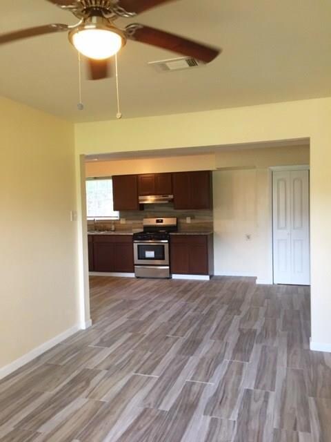 Den opens to kitchen