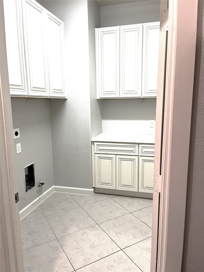 Large Laundry room with extra storage.