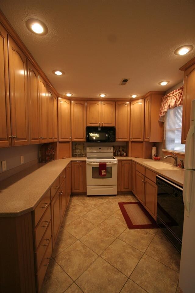 Shamrock Cabinets, Solid Surface Counter Tops and 
