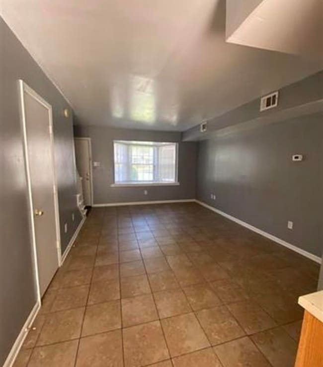 View of tiled spare room