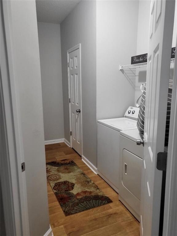 Clothes washing area featuring laundry area, washe