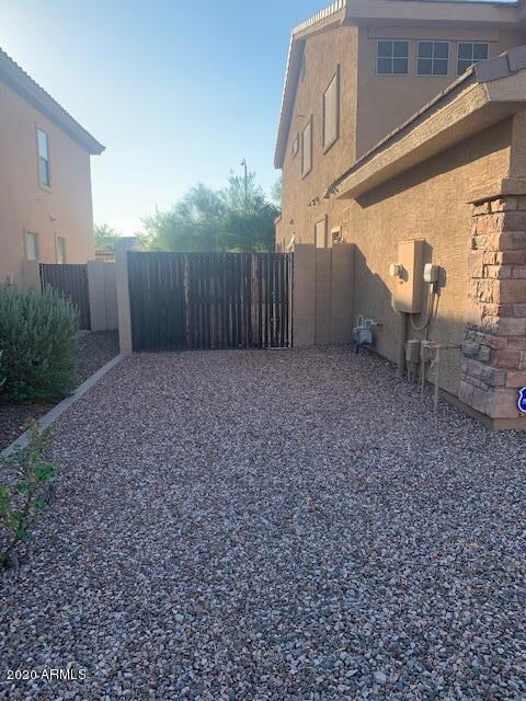 RV gate on south side of home
