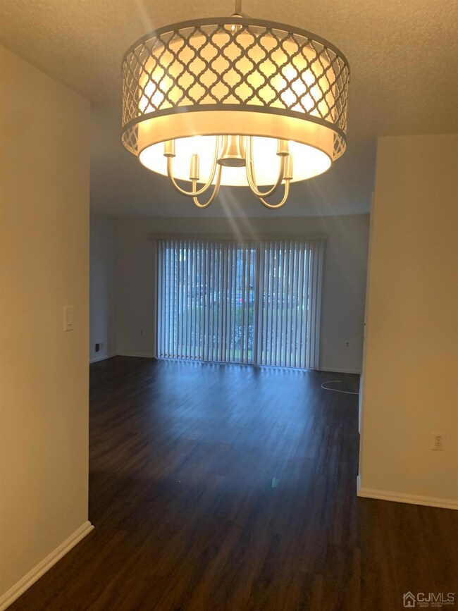 Dining room space looking into living room