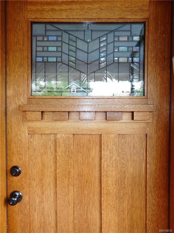 Then enter your new home through this solid wood d