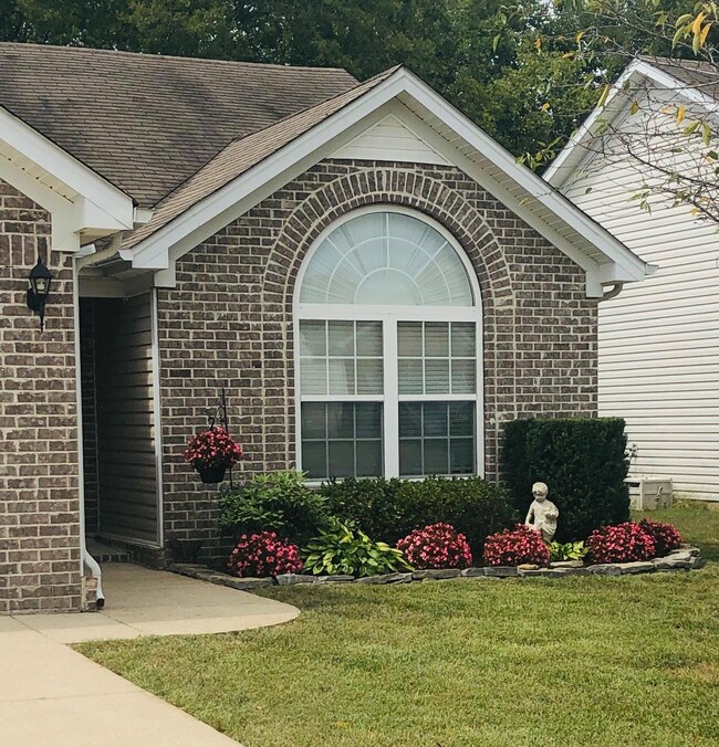 Gorgeous flowers make the curbside appeal beautiful!