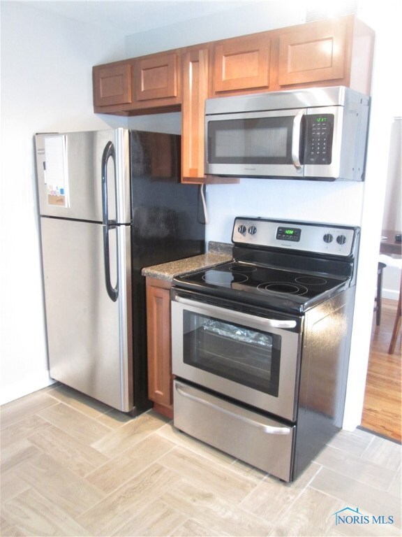 New tile floor, cabinets, counters, & appliances!