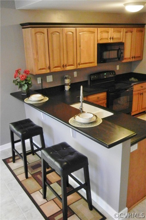 Updated Counter Tops and Great Breakfast Bar Area.