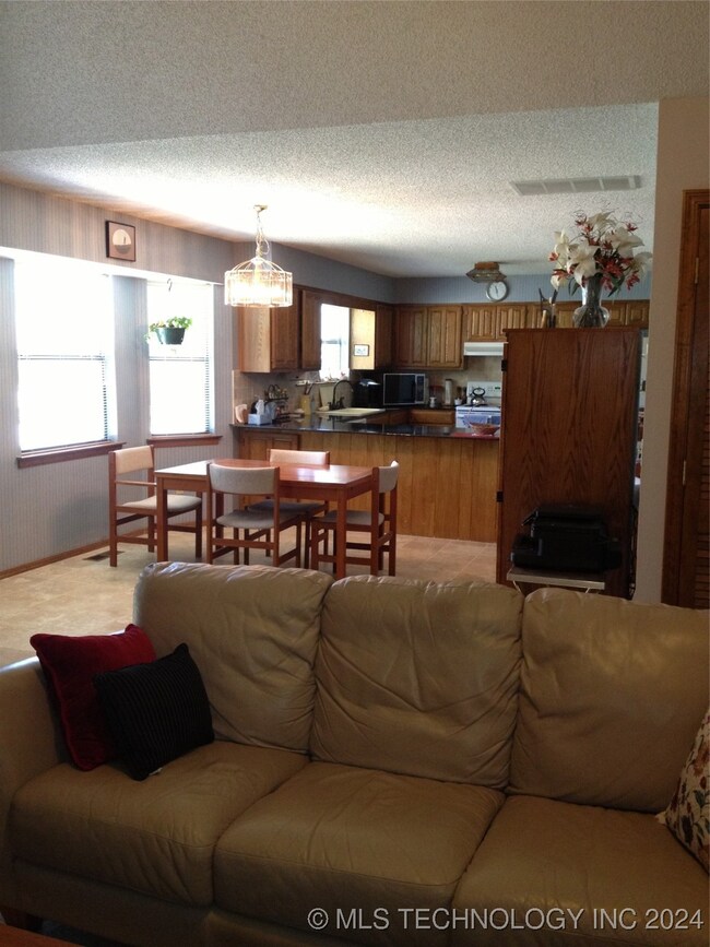 Open plan, view of kitchen from living room.