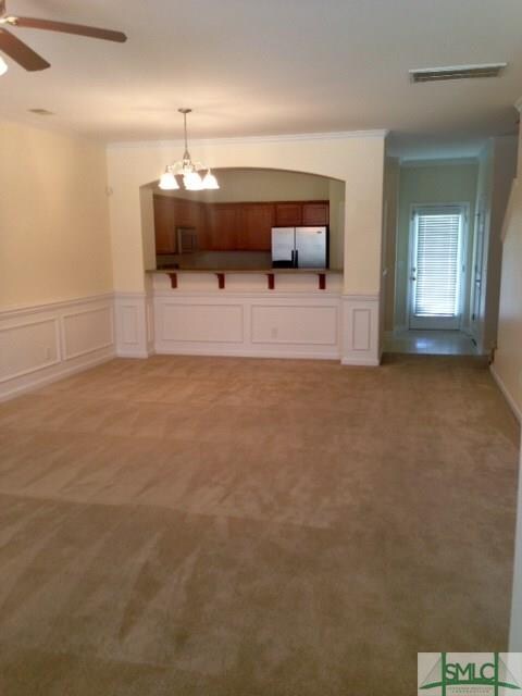 Large living and dining spaces with open kitchen c