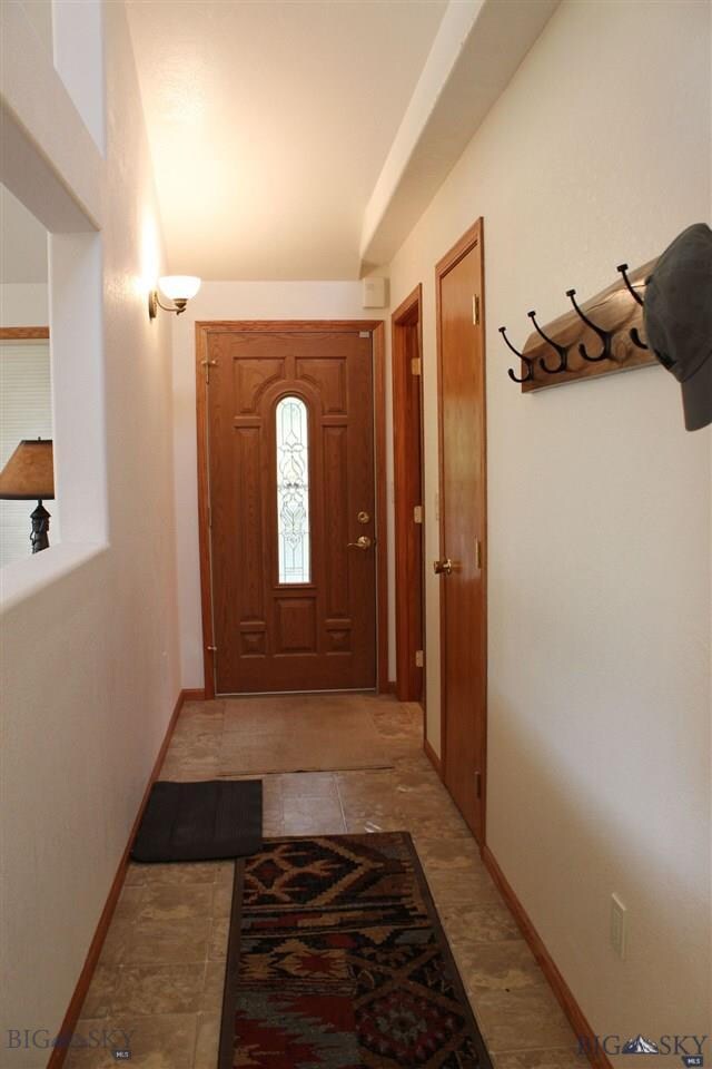 Main hallway from front door upstairs, going into