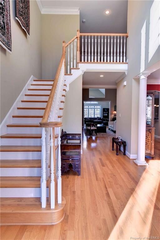 Foyer with hardwood floors.