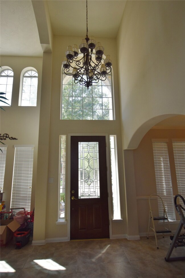 Great Natural Lighting During The Day And A Statement Piece Chandelier To Light Up The Evenings!