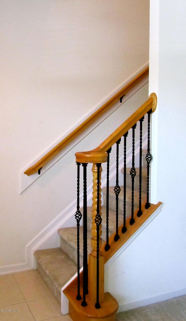 Wrought Iron Detail on Stair Railing