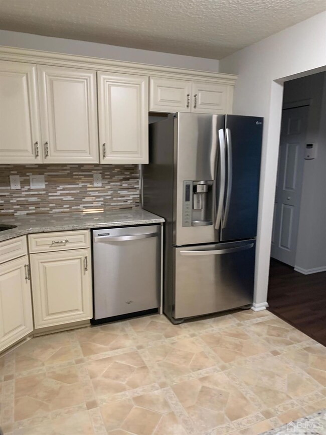 Beautiful modern newer kitchen with top appliances and room for small table