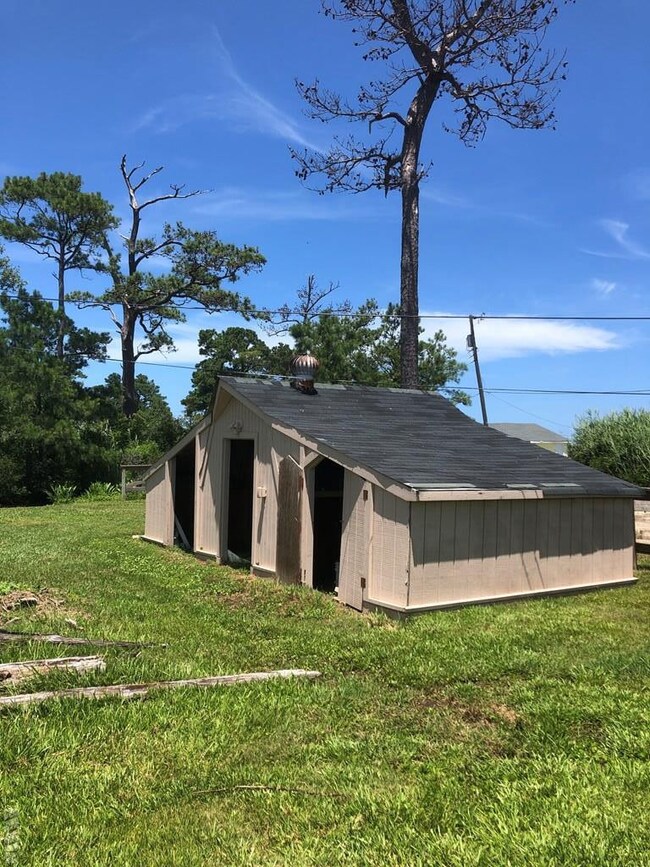 Large 3-bay shed.