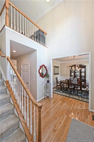Entry way Opens into Dining Room with Hardwoods Th