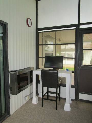 Sc room desk, fireplace