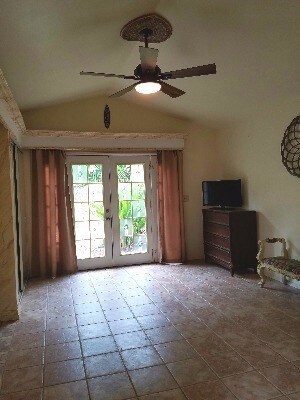 Back room opens onto private back yard.