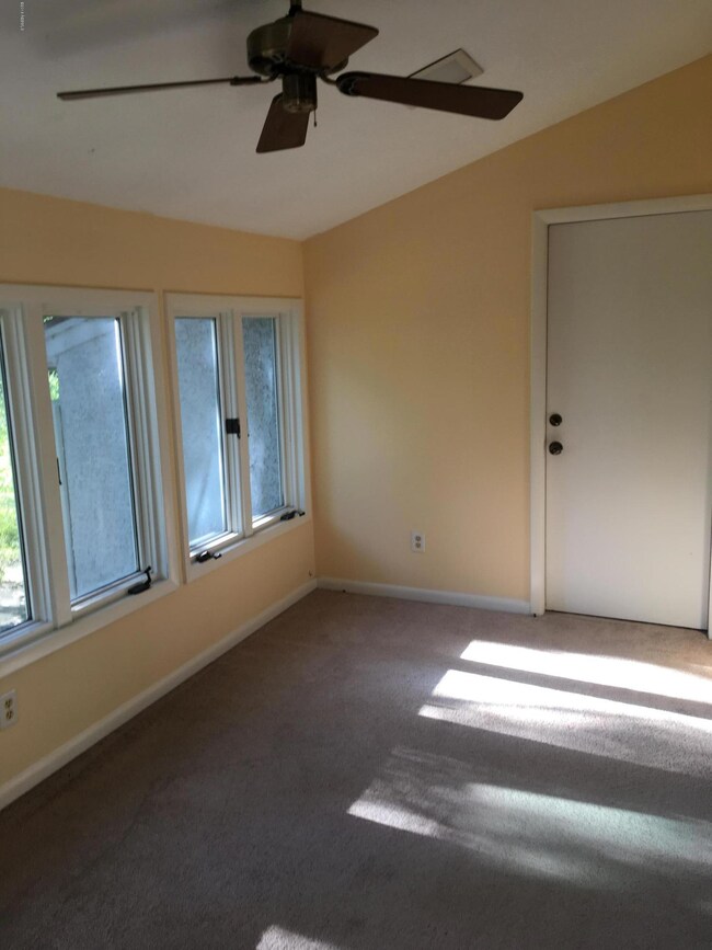 another view of sunroom off lving room