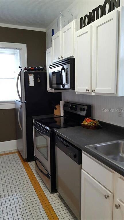 Stainless appliances including dishwasher and disposal