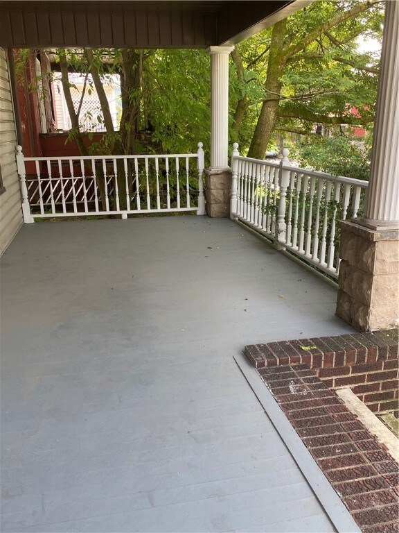 Large front porch provides a covered space to enjo