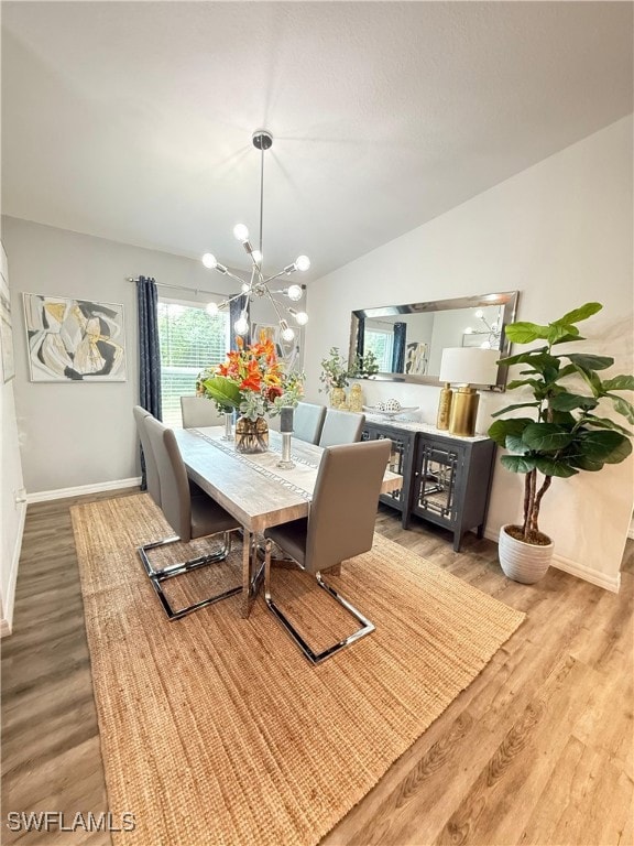Dining area featuring light wood-type flooring, a