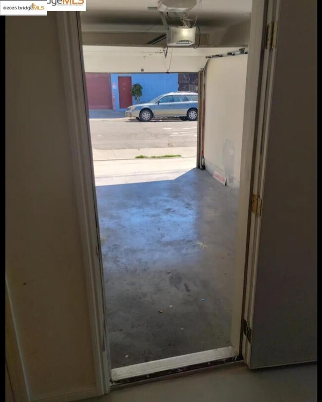 Entryway featuring unfinished concrete flooring