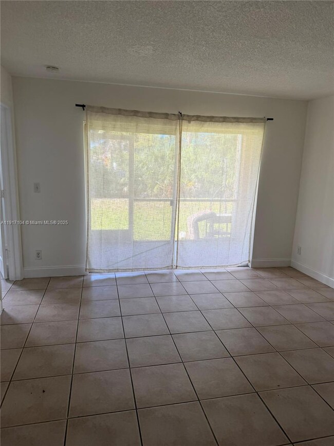 2401 NW 56th Ave unit 3-103, Lauderhill, FL 33313 - photo 3
