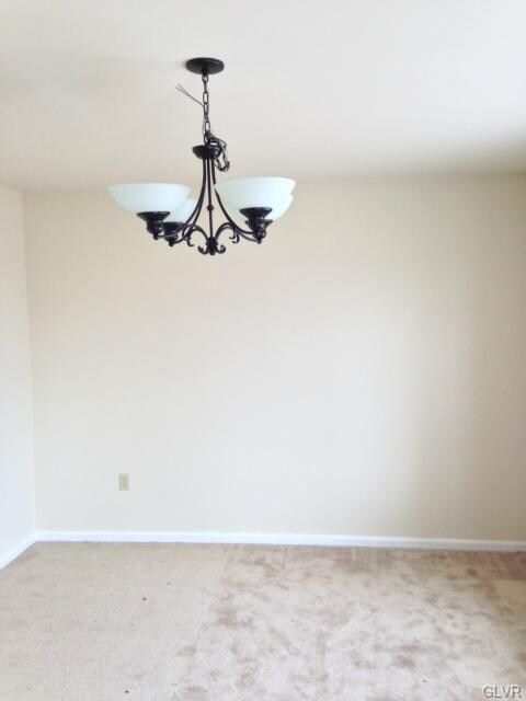 Dining Room ~ New Carpeting in earth tone ~ New li
