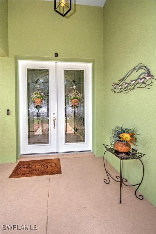 View of exterior entry with french doors
