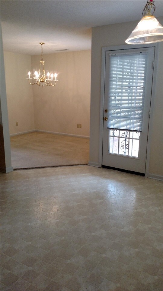 View of dining room from spacious eat-in area of 1