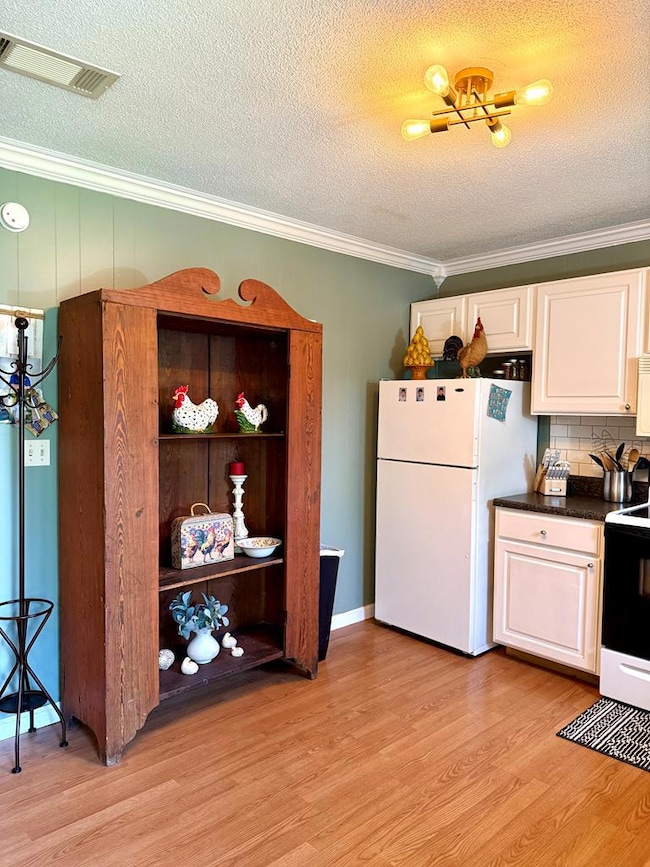 Kitchen with wall for family heirlooms