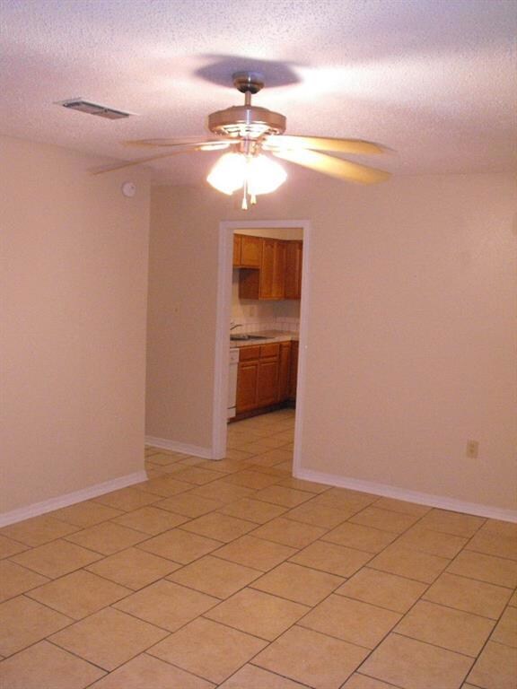 Living room to the kitchen
