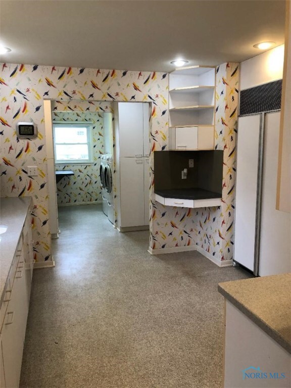 Kitchen looking into laundry room
