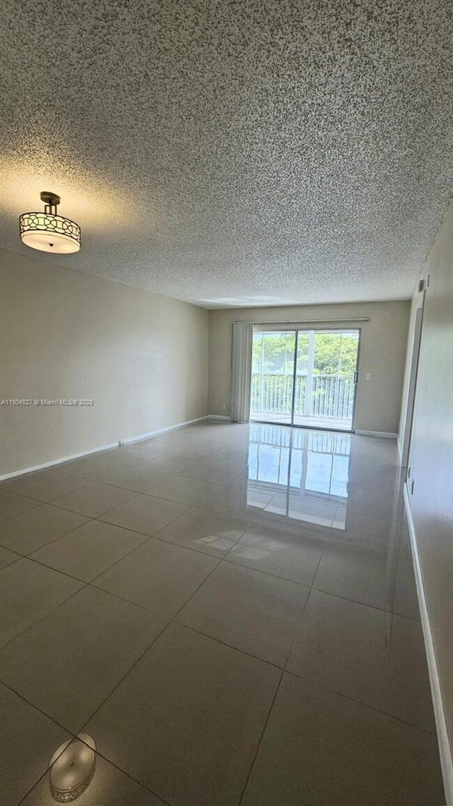 1401 SW 128th Terrace unit H410, Pembroke Pines, FL 33027 - photo 4
