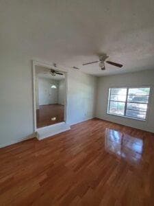 Unfurnished room featuring wood-type flooring