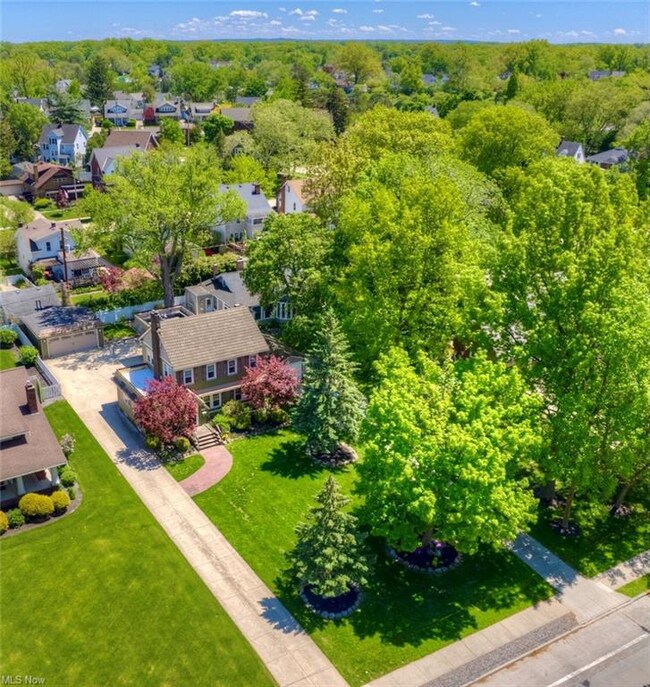 Beautiful picturesque private lot with large front yard, huge back yard area for cars and parking or turn around in driveway for convenience.